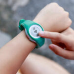 Person using a fitness tracker on their wrist