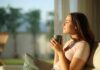Why ‘Low Dopamine Mornings’ Are Trending Now Woman enjoying a cup of coffee in a sunlit room