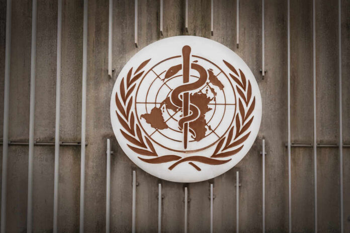 World Health Organization emblem featuring a globe and caduceus