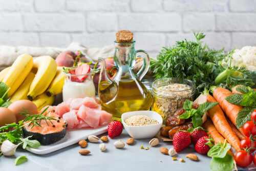 Balanced,Nutrition,Concept,For,Dash,Clean,Eating,Flexitarian,Mediterranean,Diet A variety of fresh foods including fruits, vegetables, and oils arranged on a table