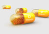 Vitamin D: Muscle Repair Miracle or Mere Myth? Vitamin D capsules with orange beads inside