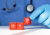 Is Your Menstrual Cycle Hiding a Serious Brain Risk? A doctor's gloved hand placing red blocks with health symbols on a table