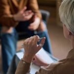 Life on Autopilot: How To Stop the Silent Drift Two individuals engaged in a conversation during a counseling session