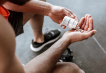 Joint-Health Supplement Tied To Faster Dementia Person pouring probiotic pills into their hand