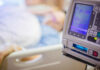 Older Patients’ Brains Hijacked In-Hospital IV pump displaying medication flow rate in a hospital room