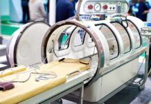 Prostate Cancer Radiation Drug Breakthrough — Blocked By Zip Code Hyperbaric oxygen chamber with open hatch and patient bed