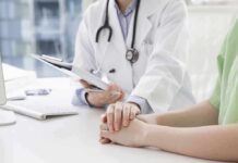 Allergy PTSD: The Hidden Trauma Doctor holding a patient's hands during consultation