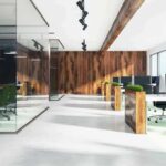 Modern open-plan office with wood accents and glass meeting room