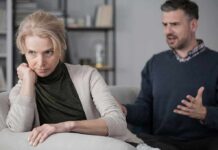 How To Regulate Emotions – The Timing Trick Woman on couch looking away as man gestures during argument