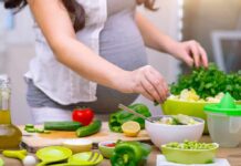 Plant Variety in Diet Beats Quantity – Here’s Why Person preparing a fresh salad with green vegetables in a kitchen