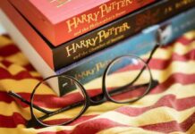 Why Page-Turners Quietly Beat Brain Decline Round black glasses on striped scarf beside Harry Potter books