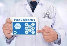 Doctor holding tablet about type 2 diabetes