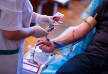 Quiet Weight Gain, Loud Blood Warning Nurse draws blood from a donor's arm