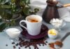 Coffee-Only Mornings? Hidden Hormone Chaos Cup of coffee with milk, butter, and spices on a table