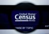 Magnifying glass over United States Census Bureau website