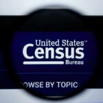 Magnifying glass over United States Census Bureau website