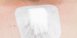 adhesive bandage on chest