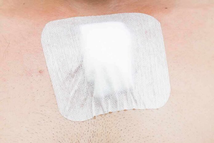 adhesive bandage on chest