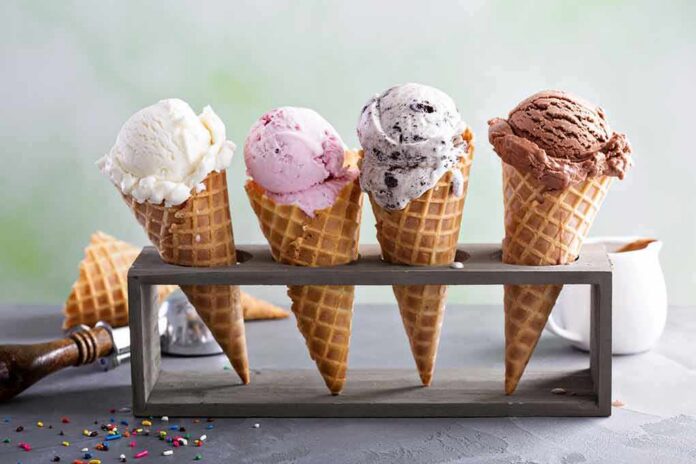shutterstock_642062308 Four ice cream cones in a wooden stand